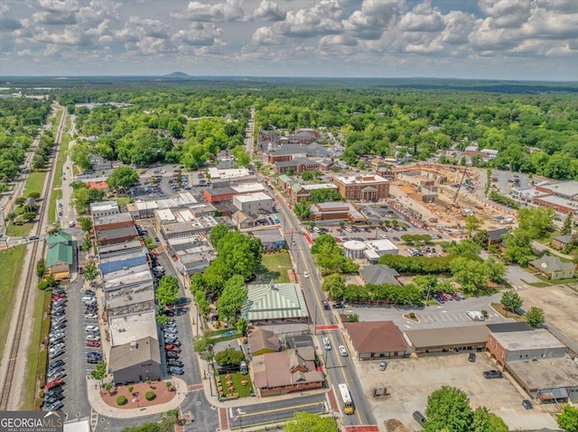 aerial overview of property's location with a forest