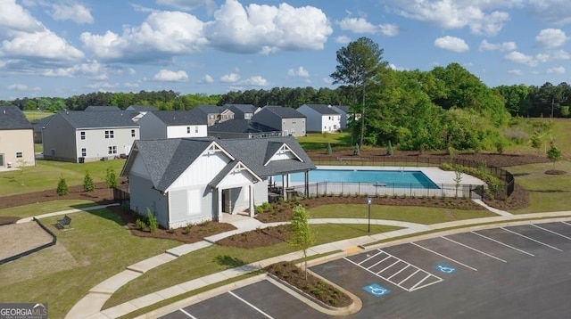 aerial perspective of suburban area with a pool