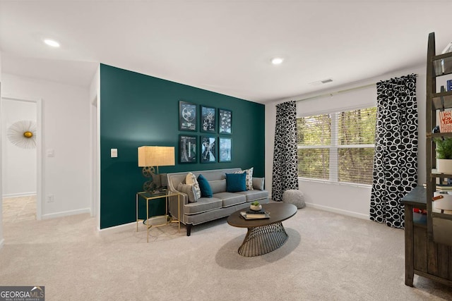 carpeted living room with baseboards and recessed lighting