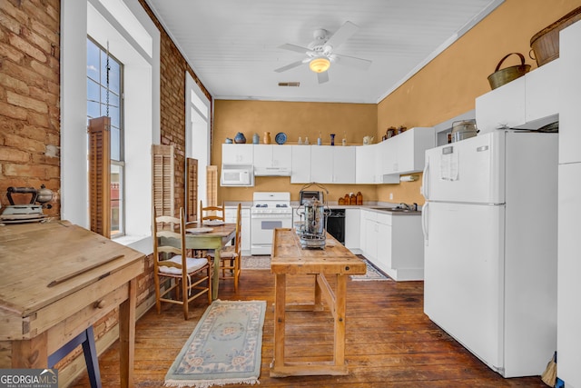 1 Public Sq, Bowman, GA 30624 - kitchen featuring white appliances, dark wood-style floors, ceiling fan, white cabinets, and brick wall