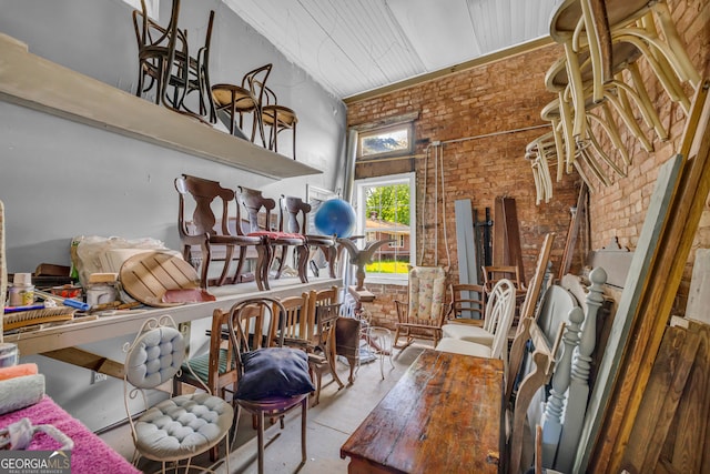 1 Public Sq, Bowman, GA 30624 - misc room featuring brick wall and a high ceiling