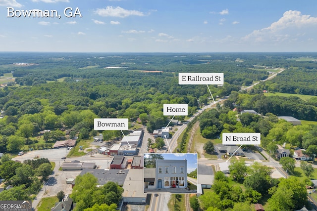 1 Public Sq, Bowman, GA 30624 - aerial view of a heavily wooded area