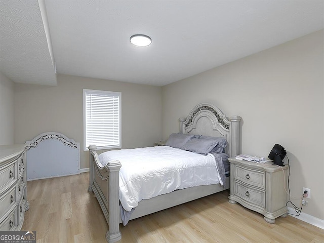201 Twin Pines Ct, Dallas, GA 30132 - bedroom with light wood-style floors and baseboards