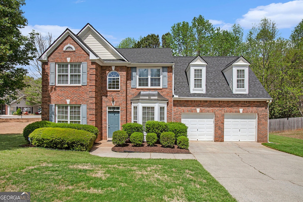 4535 Howell Farms Rd NW, Acworth, GA 30101 - view of front facade featuring driveway, brick siding, and a shingled roof