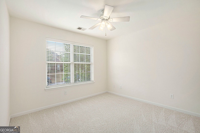 4535 Howell Farms Rd NW, Acworth, GA 30101 - unfurnished room with carpet floors, baseboards, and a ceiling fan