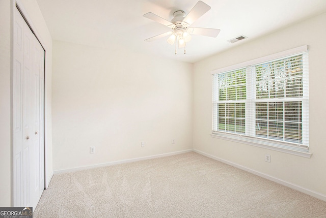 4535 Howell Farms Rd NW, Acworth, GA 30101 - unfurnished bedroom featuring baseboards, carpet floors, a closet, and ceiling fan