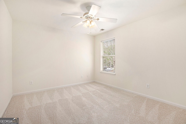 4535 Howell Farms Rd NW, Acworth, GA 30101 - carpeted spare room featuring baseboards and a ceiling fan