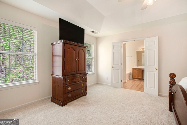 4535 Howell Farms Rd NW, Acworth, GA 30101 - bedroom with light carpet, baseboards, ensuite bath, and ceiling fan