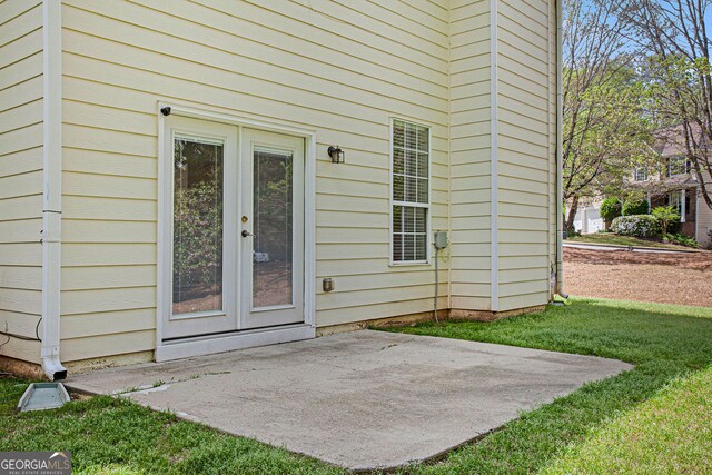 4535 Howell Farms Rd NW, Acworth, GA 30101 - entrance to property with a patio area, a lawn, and french doors