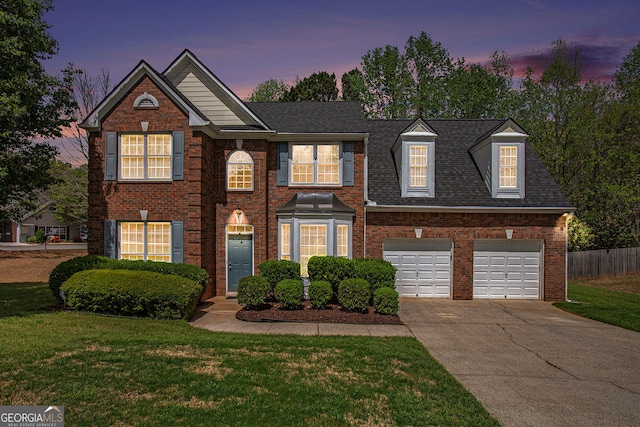 4535 Howell Farms Rd NW, Acworth, GA 30101 - colonial house featuring driveway, brick siding, and a garage