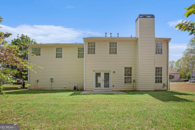 4535 Howell Farms Rd NW, Acworth, GA 30101 - rear view of house featuring a lawn, french doors, and a chimney