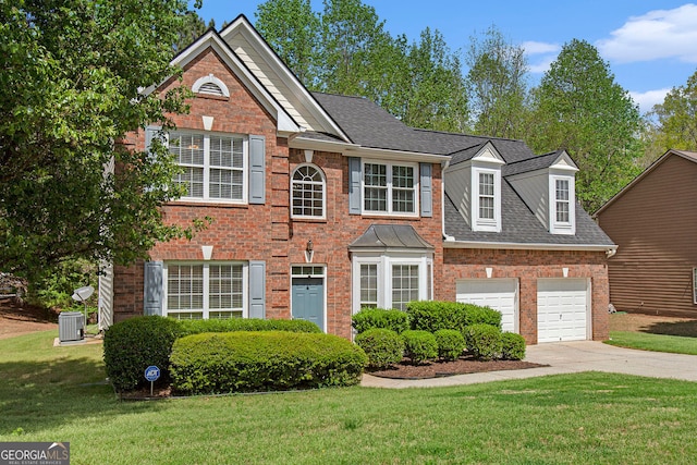 4535 Howell Farms Rd NW, Acworth, GA 30101 - view of front facade with brick siding, concrete driveway, a front yard, and roof with shingles