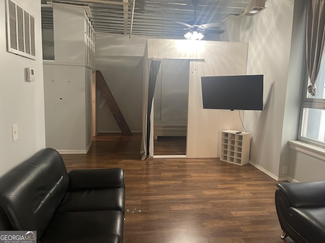 20 Marietta St NW Unit 10F, Atlanta, GA 30303 - living area featuring wood finished floors, baseboards, and a ceiling fan
