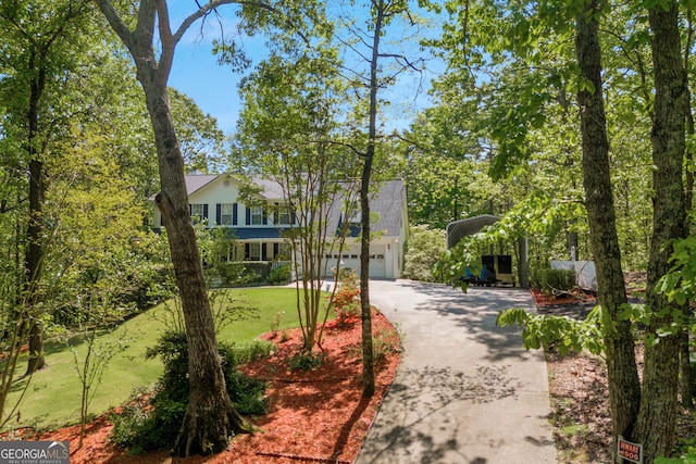 1886 Bend N Hickory Rd, Toccoa, GA 30577 - view of front facade with driveway, a carport, a front yard, and a garage