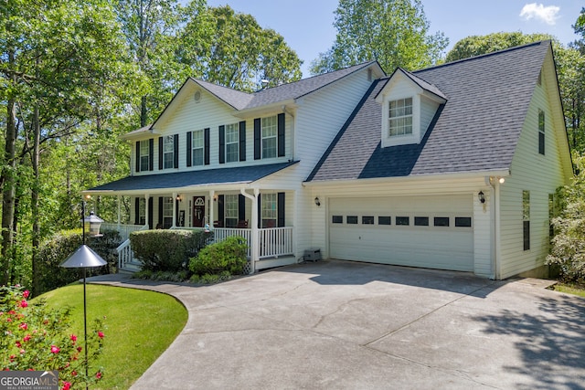 1886 Bend N Hickory Rd, Toccoa, GA 30577 - view of front of house with a porch, concrete driveway, a garage, and a shingled roof