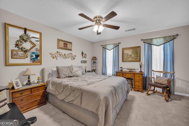 1886 Bend N Hickory Rd, Toccoa, GA 30577 - bedroom featuring light carpet, a textured ceiling, and ceiling fan