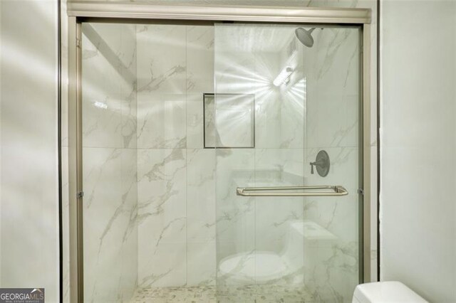 3959 Wood Path Dr, Stone Mountain, GA 30083 - bathroom with toilet and a marble finish shower
