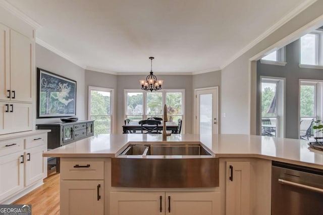 1608 Mulberry Lake Dr, Dacula, GA 30019 - kitchen with dishwasher, light countertops, a chandelier, hanging light fixtures, and healthy amount of natural light