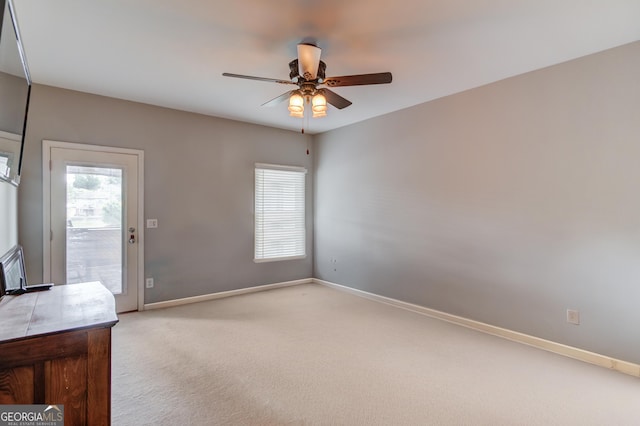 1608 Mulberry Lake Dr, Dacula, GA 30019 - unfurnished room with ceiling fan, light colored carpet, and baseboards