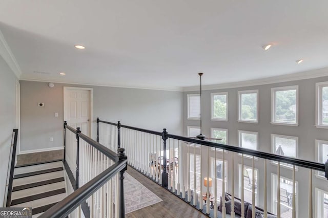 1608 Mulberry Lake Dr, Dacula, GA 30019 - hallway with ornamental molding, wood finished floors, recessed lighting, and baseboards