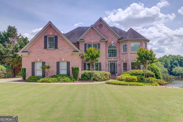 1608 Mulberry Lake Dr, Dacula, GA 30019 - view of front of property with brick siding and a front lawn