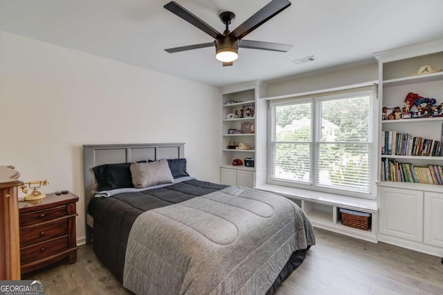 1608 Mulberry Lake Dr, Dacula, GA 30019 - bedroom with light wood finished floors and ceiling fan