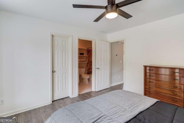 1608 Mulberry Lake Dr, Dacula, GA 30019 - bedroom featuring wood finished floors, baseboards, and a ceiling fan