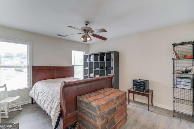 1608 Mulberry Lake Dr, Dacula, GA 30019 - bedroom featuring wood finished floors, baseboards, and ceiling fan