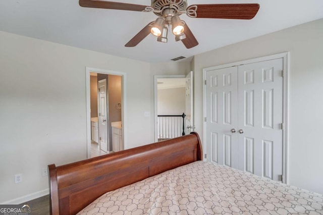 1608 Mulberry Lake Dr, Dacula, GA 30019 - bedroom with a closet, baseboards, ceiling fan, and connected bathroom