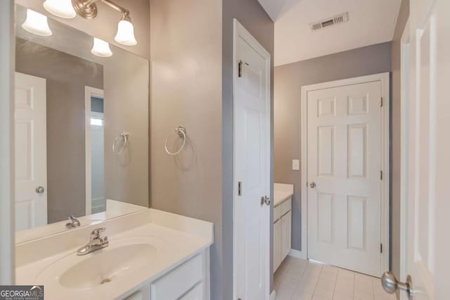 1608 Mulberry Lake Dr, Dacula, GA 30019 - bathroom featuring vanity and tile patterned floors