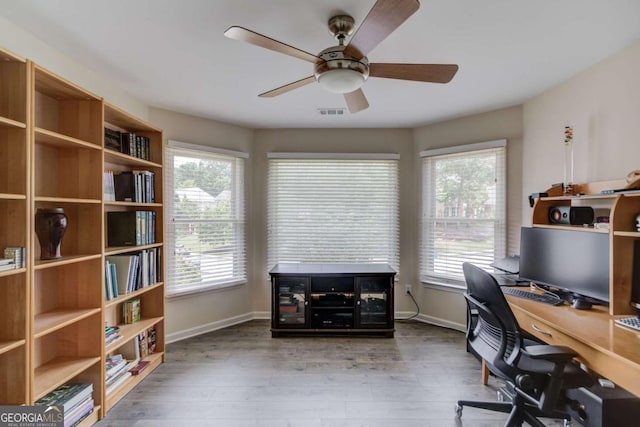 1608 Mulberry Lake Dr, Dacula, GA 30019 - office area featuring ceiling fan, baseboards, and wood finished floors