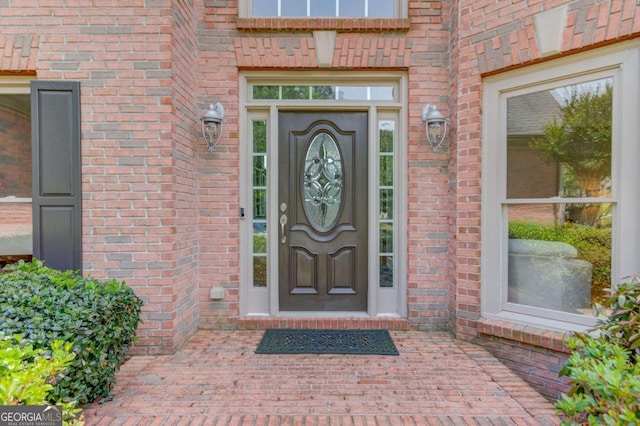 1608 Mulberry Lake Dr, Dacula, GA 30019 - view of exterior entry featuring brick siding