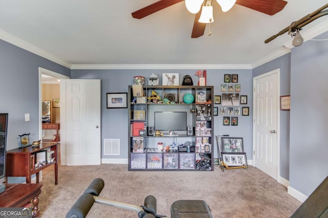 1608 Mulberry Lake Dr, Dacula, GA 30019 - living area featuring a ceiling fan, carpet, ornamental molding, and baseboards