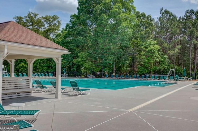 1608 Mulberry Lake Dr, Dacula, GA 30019 - community pool with a patio and fence