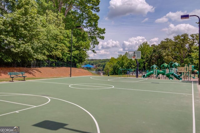 1608 Mulberry Lake Dr, Dacula, GA 30019 - view of basketball court with community basketball court and fence