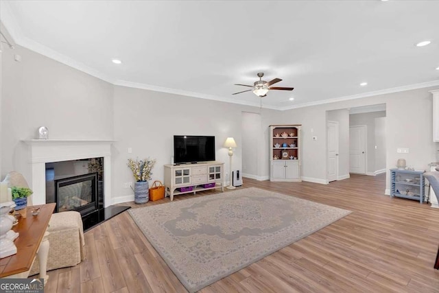 427 Bluffs View Ln, Canton, GA 30114 - living area with a ceiling fan, a glass covered fireplace, light wood finished floors, recessed lighting, and baseboards