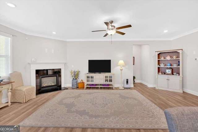 427 Bluffs View Ln, Canton, GA 30114 - living area with wood finished floors, ceiling fan, recessed lighting, baseboards, and a glass covered fireplace