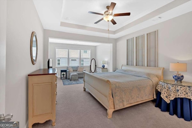 427 Bluffs View Ln, Canton, GA 30114 - bedroom with light carpet and a tray ceiling