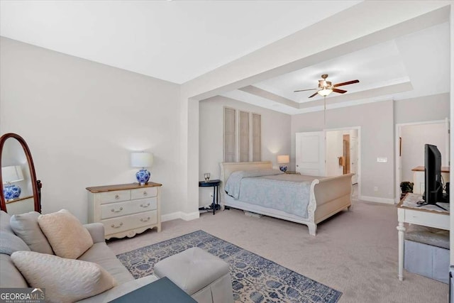 427 Bluffs View Ln, Canton, GA 30114 - carpeted bedroom featuring a raised ceiling, baseboards, and ceiling fan