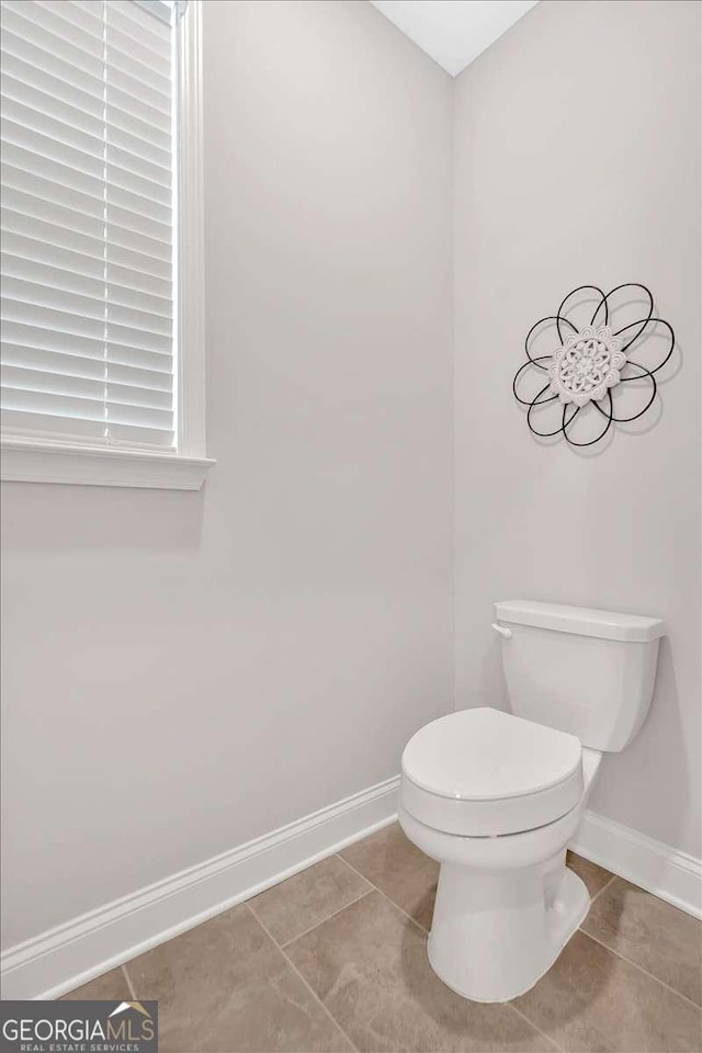 427 Bluffs View Ln, Canton, GA 30114 - bathroom featuring tile patterned floors, baseboards, and toilet