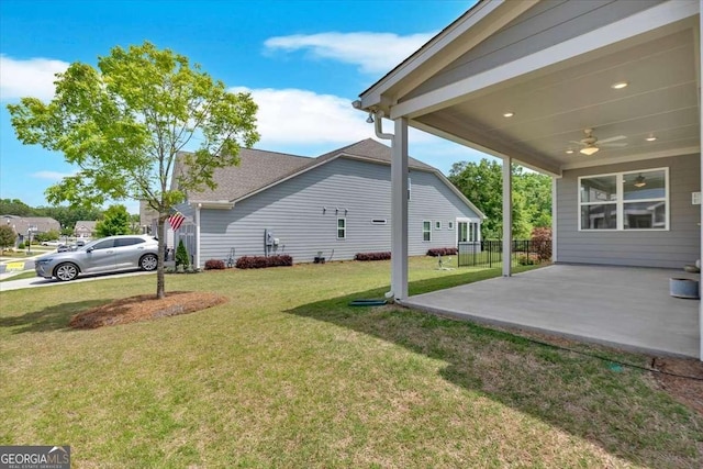 427 Bluffs View Ln, Canton, GA 30114 - view of green lawn with ceiling fan and a patio area