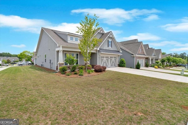 427 Bluffs View Ln, Canton, GA 30114 - craftsman-style home with driveway, board and batten siding, a front lawn, and a garage