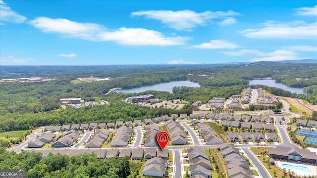 427 Bluffs View Ln, Canton, GA 30114 - view of property location with a heavily wooded area, a large body of water, and nearby suburban area