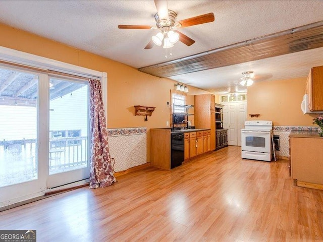 219 Briarwood Dr, Dallas, GA 30132 - kitchen with white appliances, a ceiling fan, brown cabinetry, light wood-style floors, and a textured ceiling