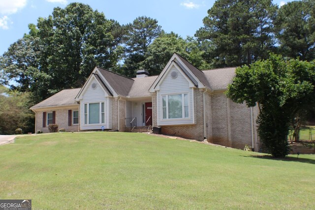 1311 N Brandy Shls, Conyers, GA 30013 - single story home with brick siding and a front lawn