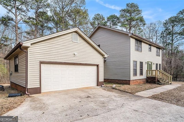 1791 Lake George Dr, Lithia Springs, GA 30122 - view of side of home featuring driveway and a garage