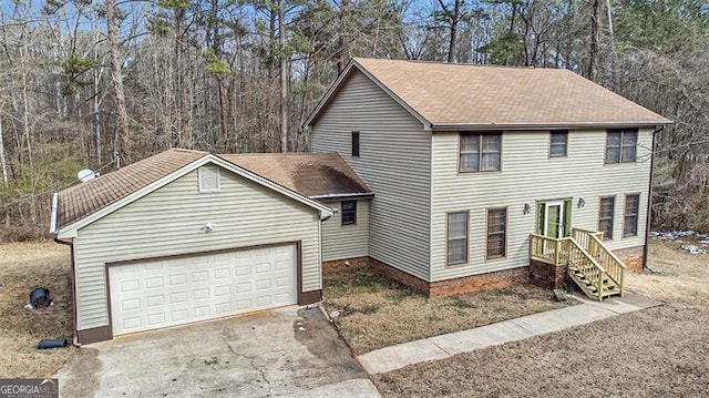 1791 Lake George Dr, Lithia Springs, GA 30122 - view of front of house featuring driveway, a garage, and a shingled roof