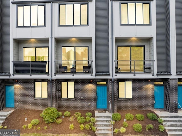 701 Pryor St SW # 5, Atlanta, GA 30315 - back of house featuring brick siding and a balcony