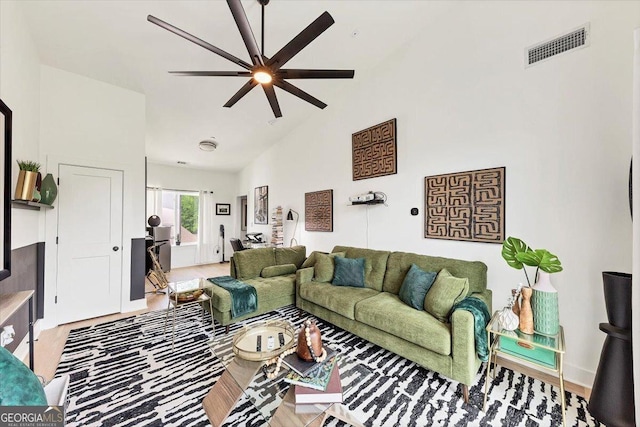 701 Pryor St SW # 5, Atlanta, GA 30315 - living area featuring a ceiling fan, high vaulted ceiling, and wood finished floors