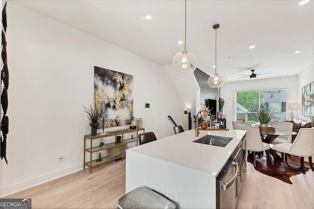 701 Pryor St SW # 5, Atlanta, GA 30315 - kitchen featuring a sink, stainless steel dishwasher, light wood-type flooring, ceiling fan, and recessed lighting